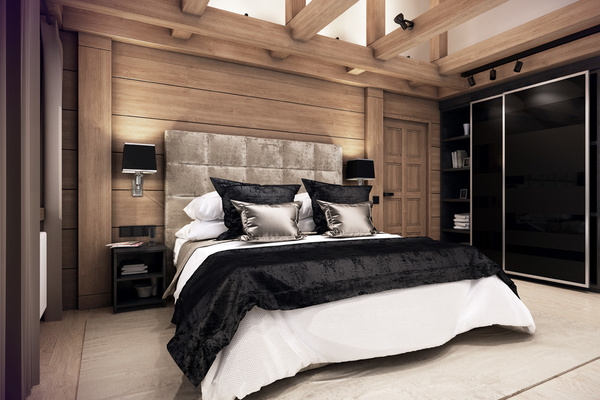 спальня в деревянном доме с черным шкафом купе